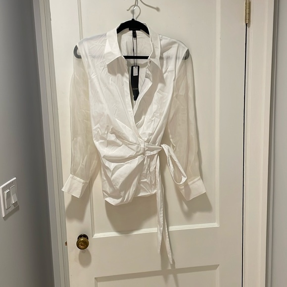 Stunning white crossover tie blouse with Swarovski crystal button sheer sleeves